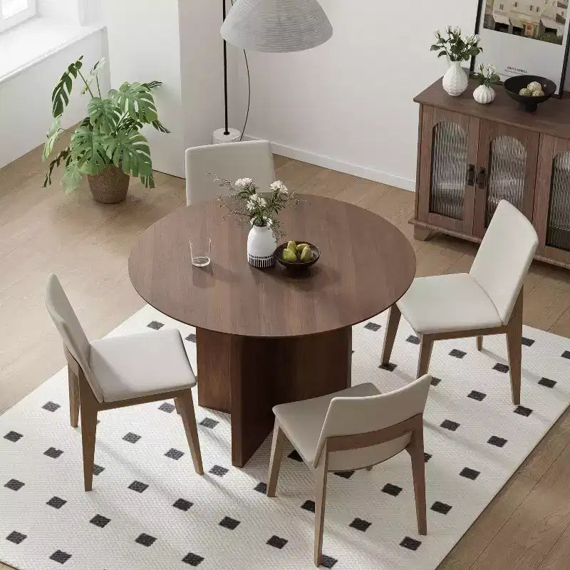 Table de salle à manger ronde en bois massif avec finition noyer et pieds arqués pour salles à manger et cuisines modernes