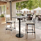 Table de salle à manger haute avec plateau HPL, faux béton gris, piètement en fer