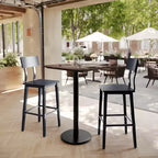 Table de salle à manger haute avec plateau HPL, faux béton gris, piètement en fer