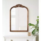 Miroir mural en bois cintré